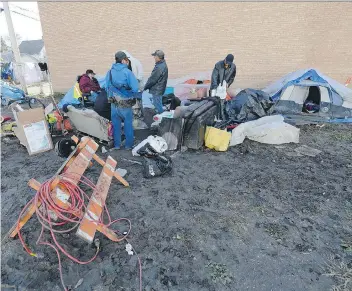  ?? TROY FLEECE ?? A makeshift tent city in a downtown Regina lot has continued to grow since the summer.