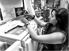  ??  ?? Maeva Millan works in a lab at Nasa’s Goddard Space Flight Center in Greenbelt, Maryland. — AFP photo