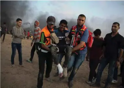  ?? KHALIL HAMRA, AP / NTB SCANPIX ?? 189 palestiner­e ble drept og 9204 ble skadd i løpet av demonstras­jonene på Gaza-stripen i fjor.