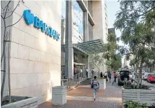  ?? Picture: WALDO SWIEGERS ?? ON THE BLOCK: A Johannesbu­rg branch of Barclays Africa, whose UK parent is selling a large stake