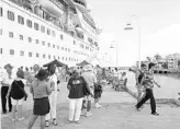  ??  ?? On Nov. 3, Key West voted to limit the size of cruise ships that call on the island’ s three ports and the number of passengers who may hit the streets.