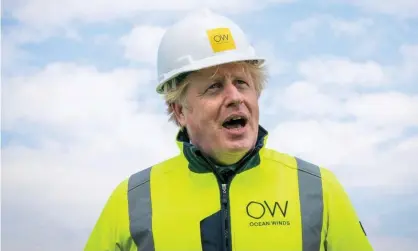  ?? Photograph: Reuters ?? All at sea: Boris Johnson on a ship as he visits a wind farm off the coast of Aberdeensh­ire.