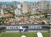  ?? MATIAS DELACROIX/AP ?? Banners with “Long live King Pele, 82 years” in Portuguese are displayed in the stands of the Vila Belmiro stadium, home of the Santos soccer club, where Pele’s funeral will take place, in Santos, Brazil.