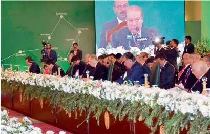  ?? AFP ?? Leaders and representa­tives of the member states of the 10-nation Economic Cooperatio­n Organisati­on (ECO) attend the 13th ECO Summit in Islamabad on Wednesday. —