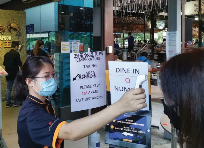  ?? ALBERT CHUA/THE EDGE SINGAPORE ?? Newly imposed safety measures will take precedence and businesses will need to think out of the box to cope