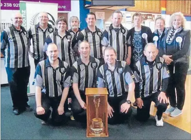  ??  ?? Winners: The champion Tawanui Indoor bowlers. Back row, from left, Trevor Rayner, Frank McKenna, Jessie Moffat, Mark Andersen, Kyle Waldron, Jeff Stuart and supporters Carolyn Burr, Linda Rayner, Ginny Beyeler. Front row, from left, Avon Compton, Paul...