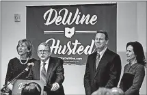  ?? [KYLE ROBERTSON/ DISPATCH] ?? From left, Fran and Mike DeWine and Jon and Tina Husted announce their ticket for GOP nomination during a press conference at the Columbus Idea Foundry on the West Side on Thursday.