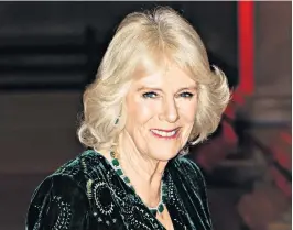  ?? ?? i Camilla sticks to a low-key make-up look with lashings of mascara, blusher and a pink lipstick