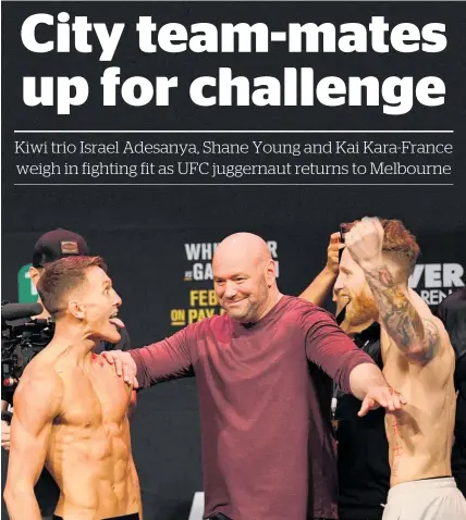  ?? Photo / Getty Images ?? City Kickboxing’s Shane Young (left) and Austin Arnett are separated by UFC supremo Dana White.