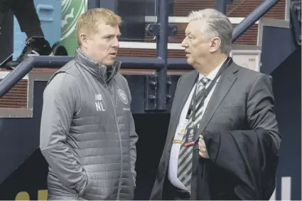  ??  ?? 0 Celtic chief executive Peter Lawwell, right, will face the flak if Neil Lennon fails to ward off Rangers’ title challenge.