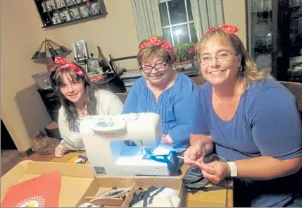  ?? COURTESY OF AIS ?? Three generation­s of ‘Rosies’ from Ashburnham, Skyler Packard, 13, Edith LeBlanc and Therese Packard, are sewing masks for front-line health care workers.