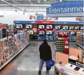  ?? Associated Press ?? Walmart is taking down all signs and displays from its stores that depict violence, following a mass shooting at its El Paso location that left 22 people dead.