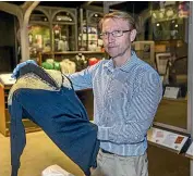  ?? MURRAY WILSON/STUFF ?? New Zealand Rugby Museum director Stephen Berg with the precious cargo, the Jimmy Hunter 1905 All Blacks jersey, he is taking to display in Rome.