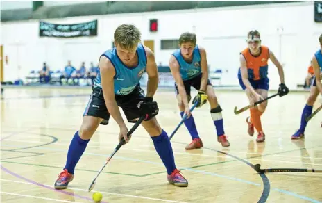  ?? Photo: Kevin Farmer ?? INDOOR ACTION: Carter Mogg of Toowoomba Funnel Webs 1 on the attack in the Queensland under-18 Men’s Indoor Invitation­al at USQ’s Clive Berghofer Recreation Centre last month. Indoor hockey returns to the centre this weekend when Toowoomba hosts the Super 6s men and women championsh­ips for the first time.