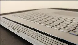  ??  ?? The Surface Book 3 is surrounded by artfully concealed vents, both in the tablet section and along the base, as seen here.