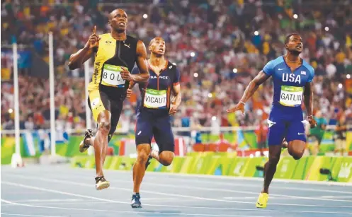  ??  ?? Usain Bolt of Jamaica (L) celebrates after winning the 100m dash ahead of Justin Gatling of USA (R)and Vicaut (C) of France at the 2016 Olympics in Rio de Janeiro