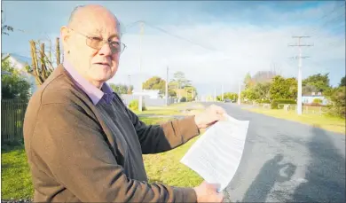  ?? PHOTO: PAUL TAYLOR ?? Bill Stevenson, from Ongaonga, holds the petition sent last week to Hawke’s Bay Regional Council (see pg 3), which days earlier announced that the assets of the stalled Ruataniwha Water Storage Scheme had been sold to three CHB businessme­n for $100,000.