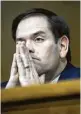  ?? Pete Marovich / Bloomberg ?? Sen. Marco Rubio, R-Fla., aggressive­ly questioned Tillerson about Russian leader Vladimir Putin.