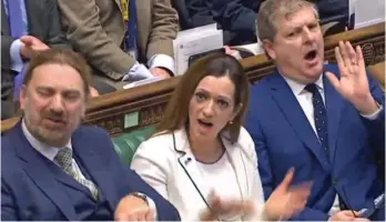  ??  ?? Baited: SNP’s Angus Robertson, far right, responds to Mrs May’s Brexit speech