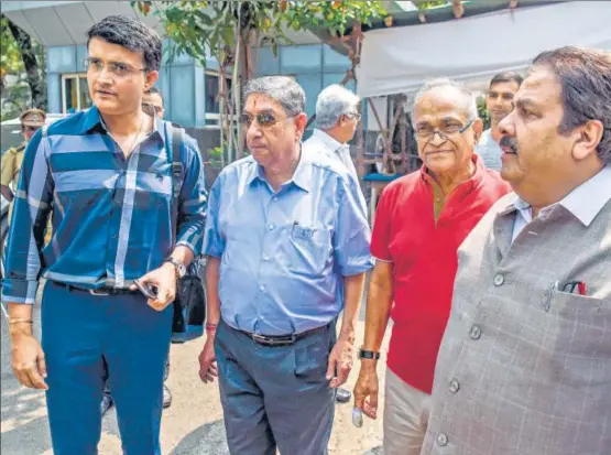  ?? AFP ?? ■ (L-R) Sourav Ganguly, former BCCI president N Srinivasan, ex-secretary Niranjan Shah and former IPL chairman Rajeev Shukla at the BCCI headquarte­rs in Mumbai on Monday.