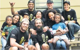  ?? Picture: Nigel Sibanda ?? EPIC. Front row: Warren Handley, left, and Tom David with family members in Joburg after the 6 000km journey that started at Kilimanjar­o in the north of Tanzania and traversed six countries.