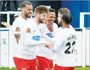  ?? PIC: Adam Williams ?? ALL SMILES: Scorer Paul McCallum, left, leads the celebratio­ns