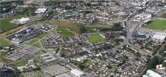  ??  ?? Tralee aerial photograph of University Hospital Kerry, top left Festival Dome next to The Rose Hotel, bottom left Rath cemetery, bottom right Clash, Marian Park, Ballinorig Estate, Fountain Court, centre right Austin Stack’s GAA grounds, top right St. John’s Church, and Moyderwell, top Tralee town park with The Ashe Memorial Hall and Tralee Library close to Austin Stacks GAA grounds. www.Johncleary­photo.com