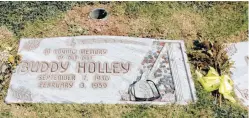  ?? Milton Adams / Knight-Ridder/Tribune ?? Buddy Holly’s grave is frequently adorned with mementos from fans, flowers, guitar picks, notes and other items.