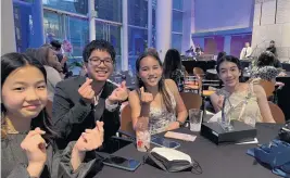  ?? Family photo ?? Mina Fedor, second from right, attends the Act to Change Community Reception in Los Angeles, Calif., with fellow AAPI Youth Rising youth board members, from left, Siwoo Rhie, Max Wong and Charlee Trenkle. Mina received the Changemake­r of the Year award at the event.