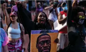  ?? Photograph: Kent Nishimura/Los Angeles Times/Rex/Shuttersto­ck ?? Ifran Aden, 41, of Minneapoli­s shouts as Toshira Garraway speaks during the inaugural remembranc­e rally and march hosted by the George Floyd Global Memorial in Minneapoli­s.