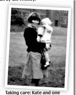  ?? ?? Taking care: Kate and one of her young charges in 1966