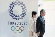  ?? ASSOCIATED PRESS FILE PHOTO ?? Tokyo Gov. Yuriko Koike, left, and Tsunekazu Takeda, president of the Japanese Olympic Committee, face a cost exceeding $30 billion.