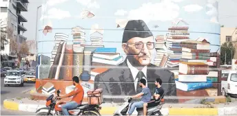  ?? ?? A mural of Iraqi author Ali al-Wardi.