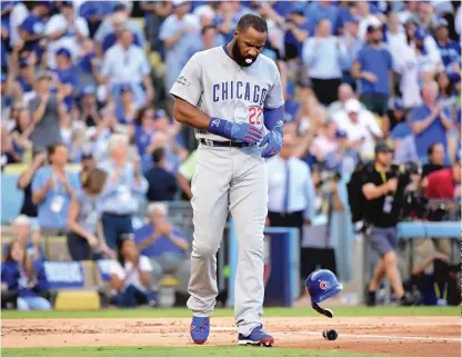  ?? | HARRY HOW/ GETTY IMAGES ?? Jason Heyward is 2- for- 28 in the postseason. His teammates have covered up his shortcomin­gs at the plate.