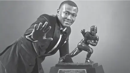  ?? TROPHY TRUST VIA USA TODAY SPORTS KENT GIDLEY/HEISMAN ?? Alabama wide receiver Devonta Smith poses for a photo after being named winner of the Heisman Trophy.