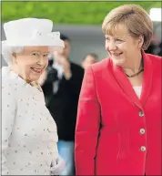  ?? Picture: EPA ?? MOMENT OF CHARM: Britain's Queen Elizabeth is greeted by German Chancellor Angela Merkel at the Federal Chanceller­y in Berlin yesterday