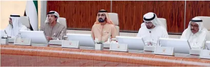  ?? Wam ?? Sheikh Mohammed bin Rashid with ministers during a Cabinet meeting at the Presidenti­al Palace in Abu Dhabi on Monday. —