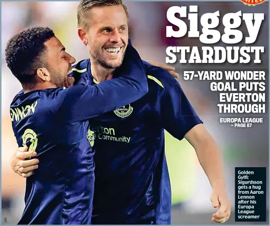  ??  ?? Golden Gylfi: Sigurdsson gets a hug from Aaron Lennon after his Europa League screamer