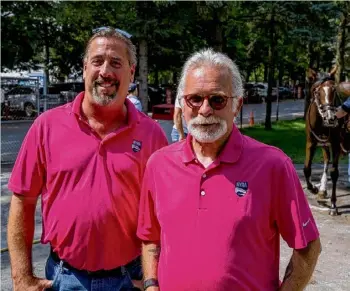  ?? Skip Dickstein/special to the Times Union ?? Farriers Mike Vinas, left and Joe Campbell stand ready to do their duty in the paddock at Saratoga Race Course on Sunday, August 20.