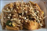  ?? (Arkansas Democrat-Gazette/Eric E. Harrison) ?? Pad Thai with fried tofu from Khao Gang Thai came in a surprising sweet-and-sour sauce.