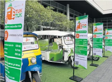  ?? PATTARAPON­G CHATPATTAR­ASILL ?? A fleet of e-tuk-tuks situated at the Pullman King Power Hotel.