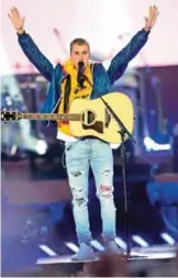  ??  ?? Canadian musician Justin Bieber performs on stage.