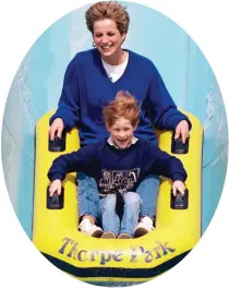  ??  ?? Hold tight: Diana and seven-year-old Harry enjoy the thrills of Thorpe Park
