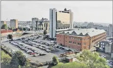  ??  ?? Above from left, Hepworth’s at the junction of Briggate and Duncan Street; Clay Pit Lane with Hepworth House on the right, pictured in October 1999; Hepworth’s reception, shown in September, 1973 .