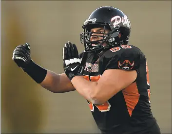  ?? JOSE CARLOS FAJARDO — STAFF ARCHIVES ?? Pittsburg’s Jacob Bandes reacts after sacking Narbonne quarterbac­k Jalen Chatman in the first quarter of the 2017 CIF State Football Championsh­ip Division 1-A Bowl Game at Sacramento State.