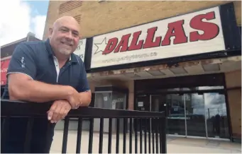  ?? DAVID BEBEE WATERLOO REGION RECORD ?? Property manager Darryl Moore outside of Dallas Nightclub in downtown Kitchener. Moore and staff are developing reopening plans.