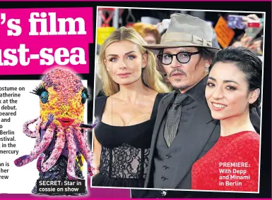  ??  ?? SECRET: Star in cossie on show
PREMIERE: With Depp and Minami in Berlin