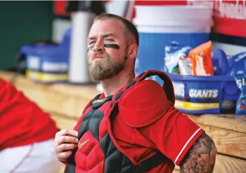  ?? ASSOCIATED PRESS FILE PHOTO ?? Reds catcher Tucker Barnhart, pictured, and other players are concerned with how a potentiall­y compressed baseball season could lead to more injuries.
