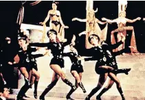  ??  ?? Springtime for Hitler, left, the show within a show choreograp­hed by Alan Johnson for The Producers; Johnson, below, receives a lifetime achievemen­t honour at the American Choreograp­hy Awards in 2003