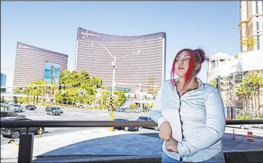  ?? Chris Day Las Vegas Review-Journal ?? Mekkah Fields, a 21-year-old leader of local Black Lives Matter protests, stands on the Strip on Thursday. She was born in Los Angeles and moved to Las Vegas over a year ago.
